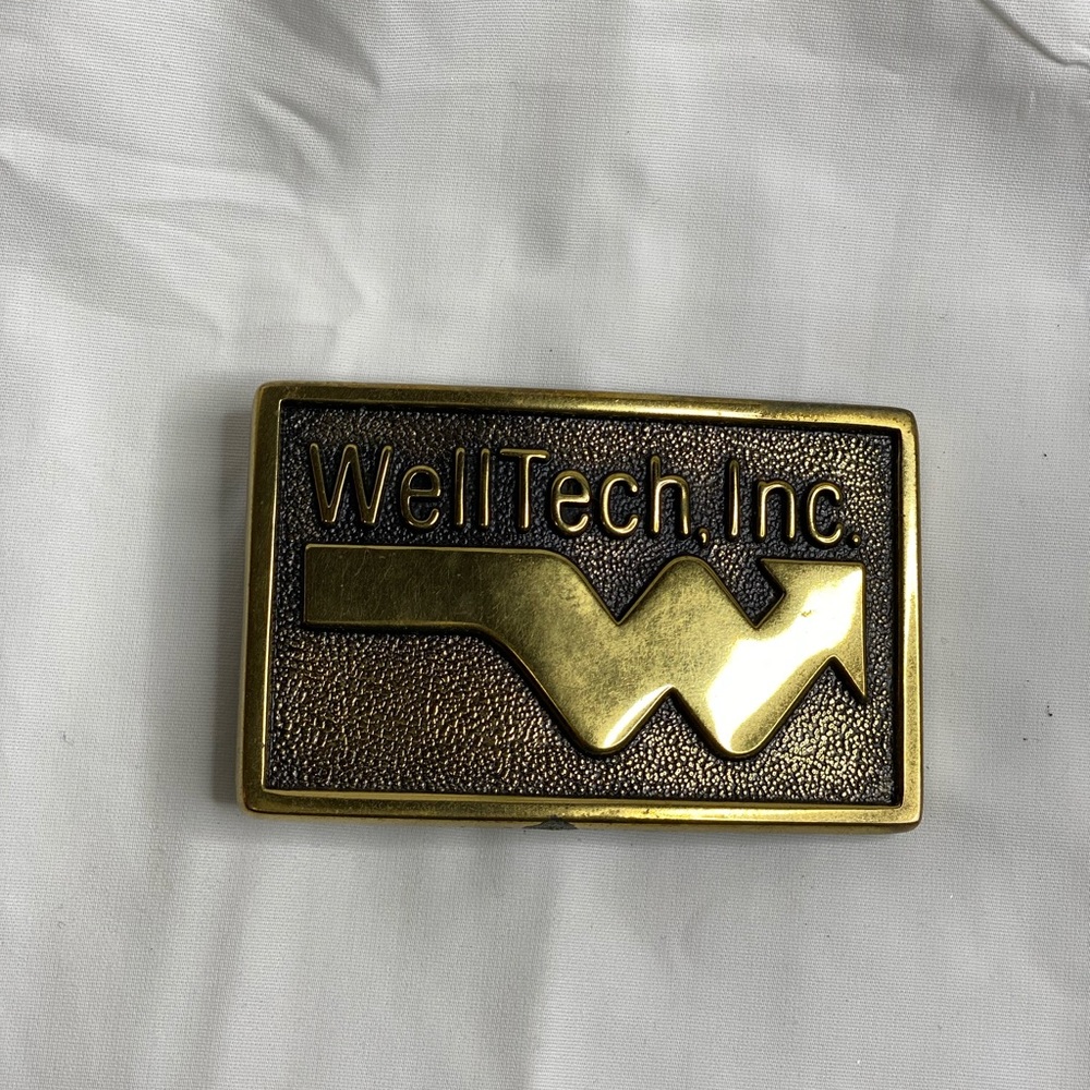 Vintage WELL TECH INC logo oil well belt buckle